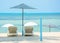 Beach Umbrella and beach bed with sunshade at seaside