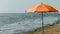 Beach umbrella on an empty beach