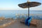 Beach umbrella on rocky shore of Red Sea, Sharm El Sheikh, Egypt
