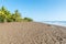 Beach umbrella and towel at playa hermosa en Costa Rica - pacific coast