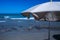 Beach umbrellas and deckchairs near the sea