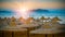 Beach umbrellas. Egypt summer shore at sunset.