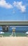 Beach umbrellas and Lifeguard chairs on the sandy beach Naminoue in Naha City in Okinawa Prefecture, Japan