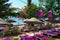 Beach umbrellas and lounge chairs under bougainvillea flowers