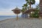 Beach umbrellas made of bamboo on the banks of the sea.