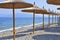 Beach umbrellas made of bamboo on the banks of the sea.