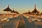 Beach umbrellas, wooden walkway, perspective