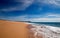 Beach under cirrus cloudscape at the Todos Santos artist community in central Baja California Mexico