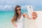 Beach vacation smartphone selfie sunglasses woman