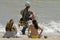 Beach vendor and women sunbathers, Brazil