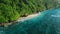 Beach with vibrant ocean and waves in Bali. Aerial view of Green bowl beach