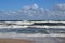 Beach view with sea shore and rough, high waves. Baltic Sea, Poland