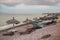 Beach view with shipwreck and reed shelters