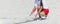 Beach volleyball referee cleans the lines from the sand