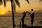 Beach volleyball, sunset on the tropics