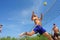 Beach volleyl balding man runs