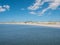 Beach and watch tower on coast of Marker Wadden island in Markermeer lake, Netherlands