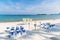 Beach wedding venue, ocean background, white and blue theme