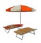 Beach white-orange umbrella and sunbeds isolated