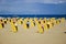 Beach wicker chairs near sea