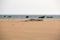 Beach, wind and fishing boats in Sidi Kaouki