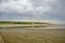 Beach with wind turbines