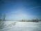 Beach in winter in Siberia. Snow and ice on the sea to the shore