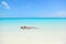 Beach woman swimming in ocean relaxing