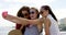 Beach, women and friends with selfie, holiday and summer with weekend break and happiness. Social media, vacation or