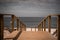 Beach wooden boardwalk in sepia tones
