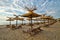 Beach with wooden sunshades