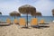 Beach with yellow chairs