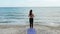 beach yoga outdoor meditation woman ocean waves