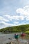 Beached canoes on remote Alaskan river bank