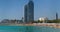 Beaches and architecture of Barcelona city.Time lapse.  Zoom out.