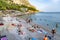 Beachgoers at Arvanitia Beach in Greece