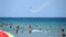 Beachgoers enjoy the Atlantic Ocean and the Fort Lauderdale Air Show