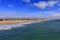 Beachront beach houses and ocean waves in the famous Seal Beach California, USA