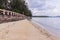 Beachside concrete retaining wall when low tide, Thailand