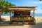 beachside eatery with menu of fresh seafood, fruits, and vegetables
