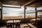 beachside eatery with view of rolling waves and sunny skies