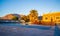 Beachside house with a pool at dawn Santorini island Greece