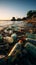 Beachside litter, including plastic bottles, highlights detrimental effects of pollution on shores
