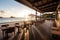 beachside restaurant with terrace, providing stunning views of the shoreline