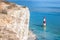 Beachy Head Lighthouse with chalk cliffs near the Eastbourne, East Sussex, England