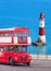 Beachy Head lighthouse with double decker bus in England, Eastbourne, UK