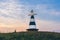 Beacon with the pointer on the hill in sunset light