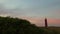 Beacon of Twilight: Lighthouse Aglow at Dusk