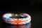 Bead crochet bracelet with United Kingdom flag on a dark background