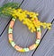 Beaded fashion Necklace `Harvest` on a deck